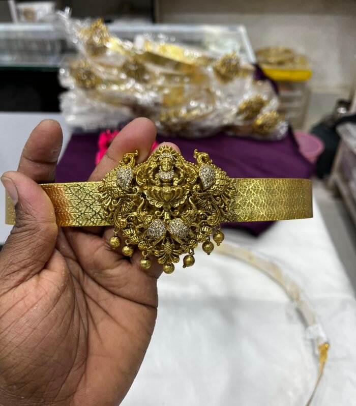 Bridesmaid Hipbelt Lakshmi Design along with Peacock statues